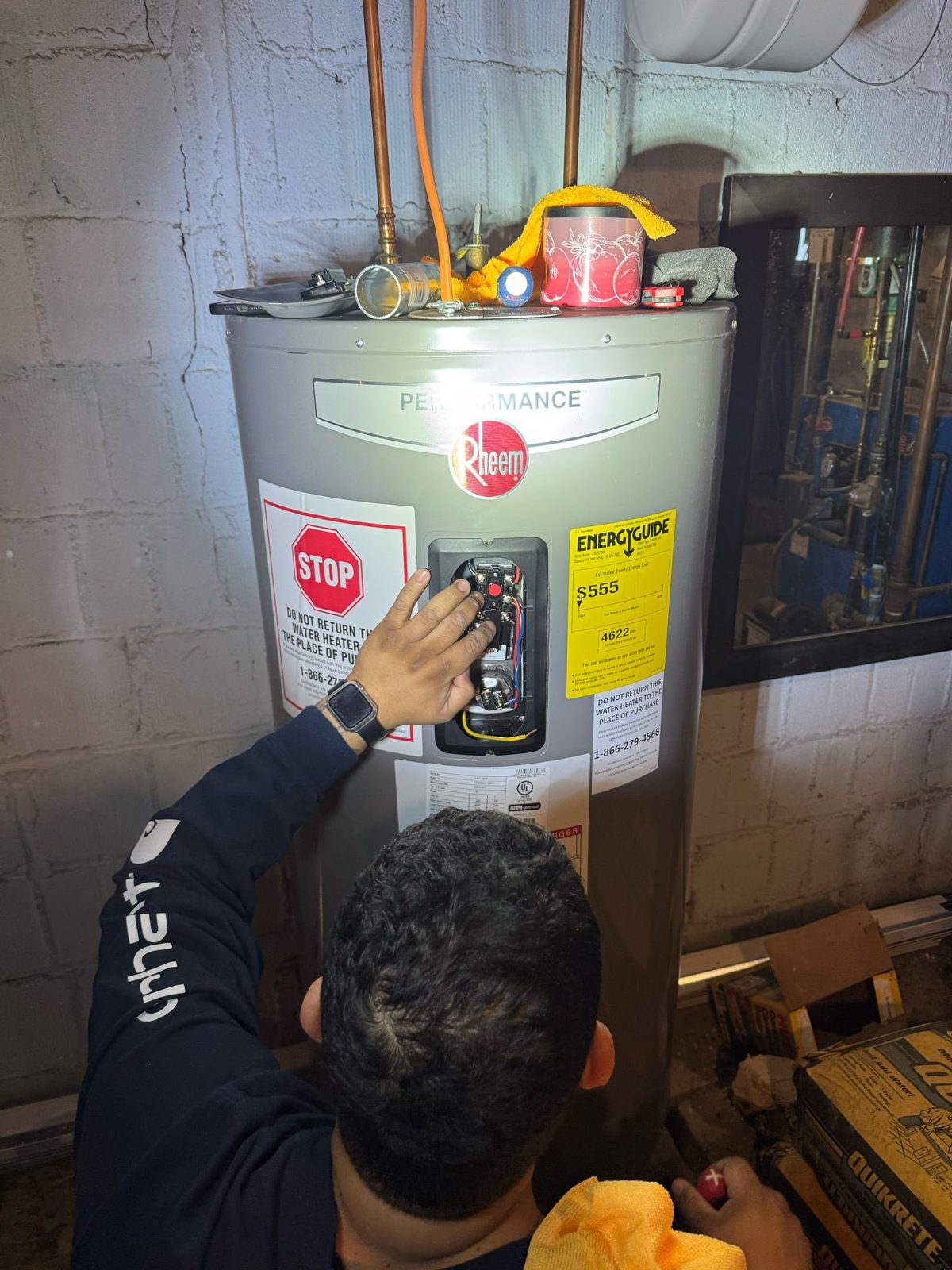 ZIS Plumbing technician installing a water tank